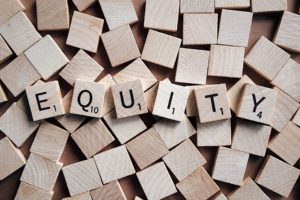 Equity written in Scrabble letters