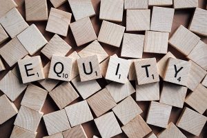 Equity written in scrabble letters