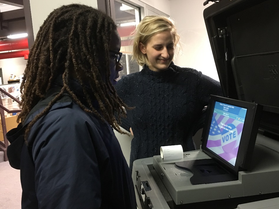 R:\Photos\2018\March Open House w TVIs\student voting 2.jpeg