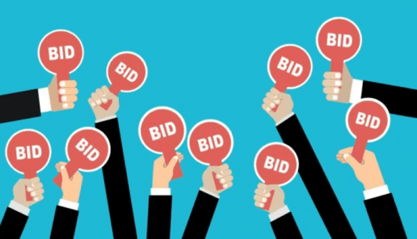 Multiple Hands with bid signs