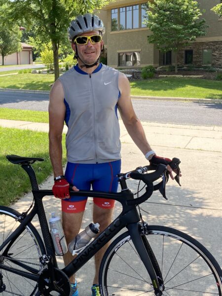 A man and his bicycle.