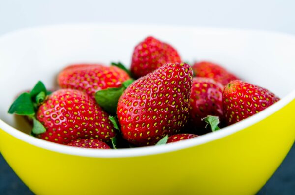 Strawberries in yellow bowl