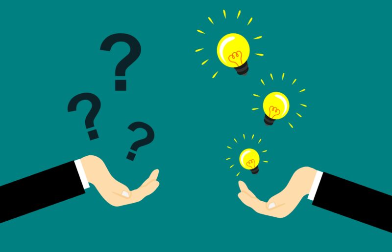 Graphic of one hand hold question marks and one hand holding light bulbs (ideas)