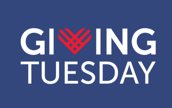 Giving Tuesday featuring the words Giving Tuesday in white letters on a blue background with a red heart serving as the V in Giving.