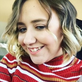 Headshot of Shayna Wederath smiling for the camera