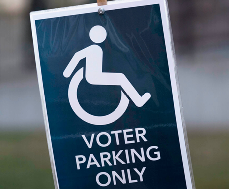 A Disabled Voter Parking Only sign