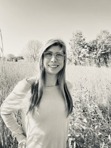 Jada Clark standing in a field