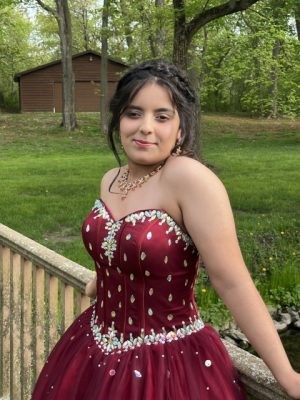 Zulikha Gondal leaning against a railing