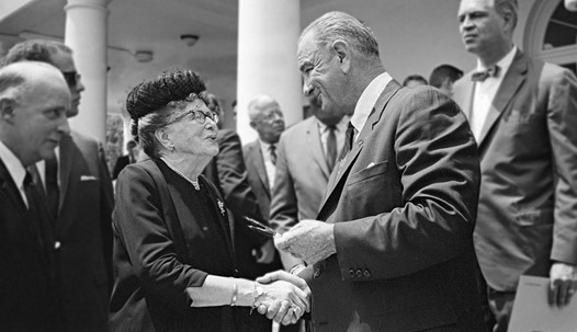 President Lyndon Johnson with Dr. Ethel Percy Andrus after signing the Older Americans Act