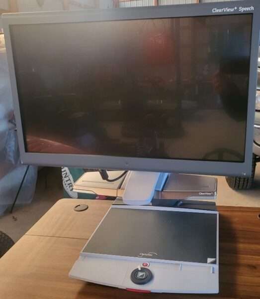 A used desktop video magnifier.