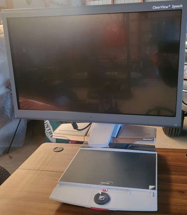 A used desktop video magnifier.