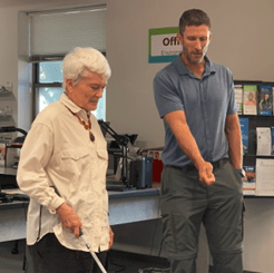 Brent Perzentka showing a client white cane technique.