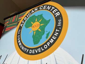 African Center for Community Development logo near the center's entrance.
