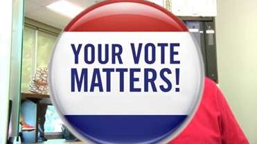 A red white and blue button that says your vote matters