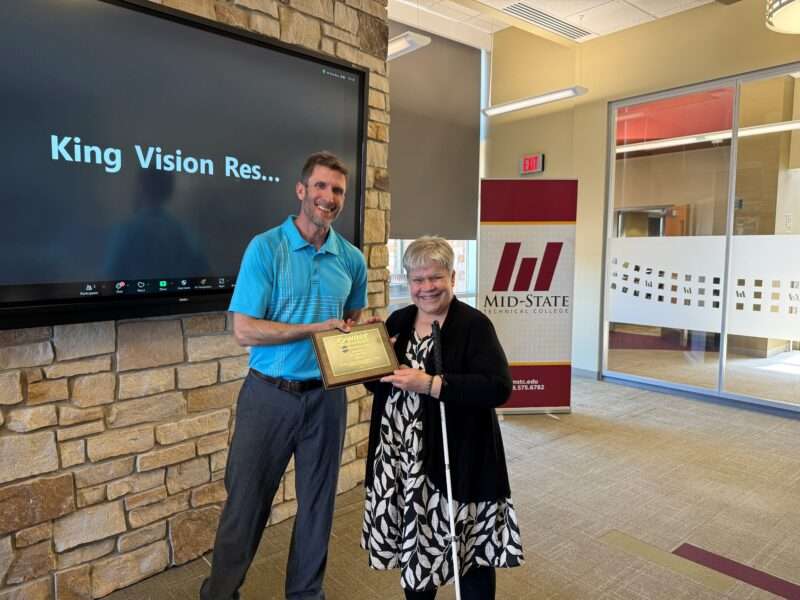 The Council’s Brent Perzentka presenting the Special Recognition Award to Denise Jess at the annual WAER Collaborative Vision Conference.
