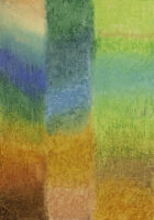 A blurry checkered pattern with oranges, peach, yellow, greens and blues.