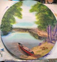 Acrylic painting on a round canvas showing a small lake with an empty, red canoe on its edge, framed by a green tree on either side.