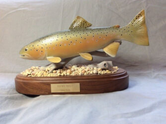 Basswood carving of a brown trout